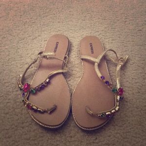 Gold sandals with colorful gems
